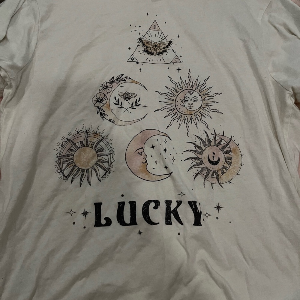 White graphic tee, lightly worn